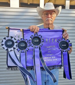 Steve Kinser attends National Blue cattle show in Tulsa, Ok.  He saw several old friends and showed four of his home raised calves.  He brought home three Grand Champion banners and one Reserve. Photo courtesy of Steve Kinser.