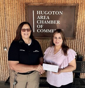 Hugoton Area Chamber od Commerce Executive Director Tina Fernandez (at right) presents a check of $150 to Stephanie Smith and Hugoton’s local animal shelter. All money collected from the Drool at the Pool event Wednesday, August 9 was given to Hugoton's Animal Shelter. The chamber would like to express its appreciation to everyone who participated and gave donations. Your support is greatly appreciated!