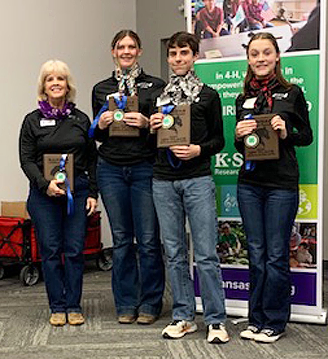 The 4-H Senior Team pictured from the left are Judy Parsons, Channing Dillinger, Cody Gerrond and Lainey Cox. They are the Senior Horse Quiz Bowl Champions at the State 4-H Horse Panorama. Photo courtesy of Judy Parsons.