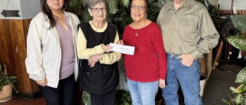 Lita and Ray Talbert, to the right, are awarded their honorary winnings. From left to right, Tina Fernandez Hugoton Chamber Director, Lana Slocum owner of The Jet where their names were originally drawn and Lita and Ray. Congratulations Ray and Lita!!!