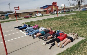 The Hugoton Lions Club purchased over 600 special glasses for the Hugoton students. The students have a creative and fun way to use their eclipse glasses to watch the spectacular total solar eclipse, last Monday, April 8.  Photo courtesy of Lions Club member Tom Romero.