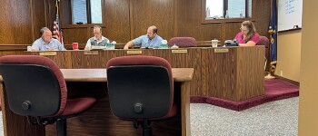 Attending to business Monday at the Commissioner’s meeting are, left to right , County Attorney Paul Kitzke, Commissioner Pat Hall, Commissioner Tron Stegman and County Clerk Amy Jo Tharp.