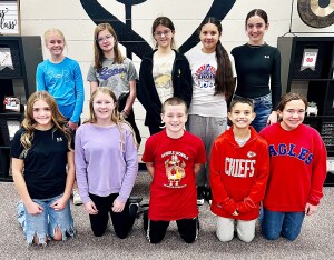 Ten HES sixth graders are selected to participate in this year's Southwest Kansas Music Educators Association Elementary Honor Choir. These students will be singing in a choir with other elementary students from the Southwest Kansas District in January in Dodge City. Students back row left to right are Kamdyn Howie, Averie Amerin, Haylea Beltz, Sophia Araiza and Madison Niehues. In the front row are Kendall Harper, McKinley Braun, Alex Moore, Cyson Hunt and Elodie Sullivan. Photo courtesy of Melissa Sullivan.